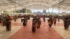 གདན་ས་བཀྲིས་ལྷུན་པོས་མང་ཚོགས་ལ་དགུ་གཏོར་གར་འཆམ་གཟིགས་འབུལ། 