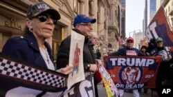 Supporters of former President Donald Trump protest outside of Trump Tower in New York City, April. 3, 2023.