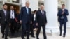 Russian President Vladimir Putin, center right, and Turkish President Recep Tayyip Erdogan, center left, leave their talks at Russia's Black Sea resort of Sochi, Russia, Sept. 4, 2023. 