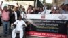 Journalists hold a demonstration to condemn the killing of senior Pakistani journalist Arshad Sharif by Kenyan police, in Karachi, Pakistan, Oct. 24, 2022. 