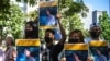 A group of activists hold placards of Japanese citizen Toru Kubota, who is detained in Myanmar, during a rally in front of the Ministry of Foreign Affairs in Tokyo on July 31, 2022. 