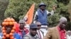 Kenya's opposition leader and presidential candidate Raila Odinga, of the Azimio La Umoja (Declaration of Unity) One Kenya Alliance, waves to his supporters after he filed a petition challenging the presidential election result at the Supreme Court in Nai