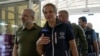 IAEA Director General Rafael Mariano Grossi and Ukrainian Minister of Energy German Galushchenko walk as the International Atomic Energy Agency mission arrives in Zaporizhzhia amid Russia's invasion of Ukraine, in Zaporizhzhia, Ukraine, Aug. 31, 2022.
