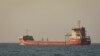 FILE PHOTO: Cargo ship "Rahmi Yagci" makes its way from the port in Odesa, Ukraine, Aug. 9, 2022. 