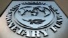 FILE PHOTO: The IMF logo is seen outside the headquarters building in Washington