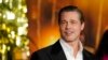 Brad Pitt pose à la première du film "Babylon", le 15 décembre 2022, à l'Academy Museum of Motion Pictures de Los Angeles. (AP Photo/Chris Pizzello)