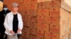 Cindy McCain, US ambassador to the U.N. Agencies in Rome, inspects relief items donated by USAID at the World Food Program warehouse, during her visit at the Kakuma refugee camp in Turkana county, Kenya, March 17, 2022. 