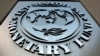 FILE: Logo Dana Moneter Internasional (IMF) pada kantor pusat IMF di Washington.