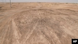 A desert area with scattered plots of agricultural land with features that closely matched the description of the al-Qadisiyah battle site described in historic texts, Nov. 10, 2024.