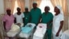Les trois premiers bébés éprouvettes de l'histoire de la fécondation in vitro au Bénin, en 2011.