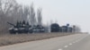 Une vue montre un convoi de troupes pro-russes pendant le conflit Ukraine-Russie à l'extérieur de la ville contrôlée par les séparatistes de Volnovakha dans la région de Donetsk, Ukraine le 12 mars 2022. (Reuters AFP/Alexander Ermochenko)