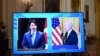 Presiden AS Joe Biden (kanan) dan Perdana Menteri Kanada Justin Trudeau memberikan keterangan kepada media melalui layar televisi, seusai pertemuan bilateral virtual di Ruang Timur Gedung Putih, 23 Februari 2021.