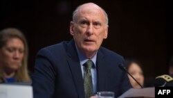 Le directeur du renseignement national, Dan Coats, témoigne sur les menaces mondiales lors d'une audience du Comité sénatorial du renseignement au Capitole, à Washington, le 13 février 2018.