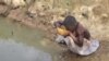 Difficulté d'accès à l'eau portable dans le nord du Bénin, le 22 mai 2017.