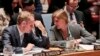 Britain's U.N. Ambassador Matthew Rycroft, left, and United States U.N. Ambassador Samantha Power, right, confer during a Security Council meeting on terrorism, May 11, 2016, at U. N. headquarters in New York.
