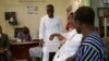 Le député Mohamed Atao Hinnouho debout, et à ses côtés l'ancien président Nicephore Soglo assis près de Valentin Djenontin, à Cotonou. (VOA/Ginette Fleure Adandé)