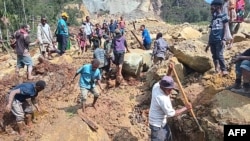 聯合國國際移民組織(IOM)表示,巴布亞新畿內亞北部偏遠村落發生的大規模山體滑坡事恐至少造成670人死亡、150棟房屋遭埋。(法新社)